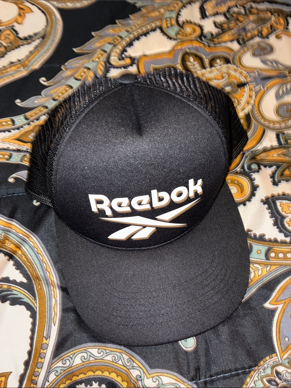 Reebok Black Foam Trucker Hat with White Raised Logo